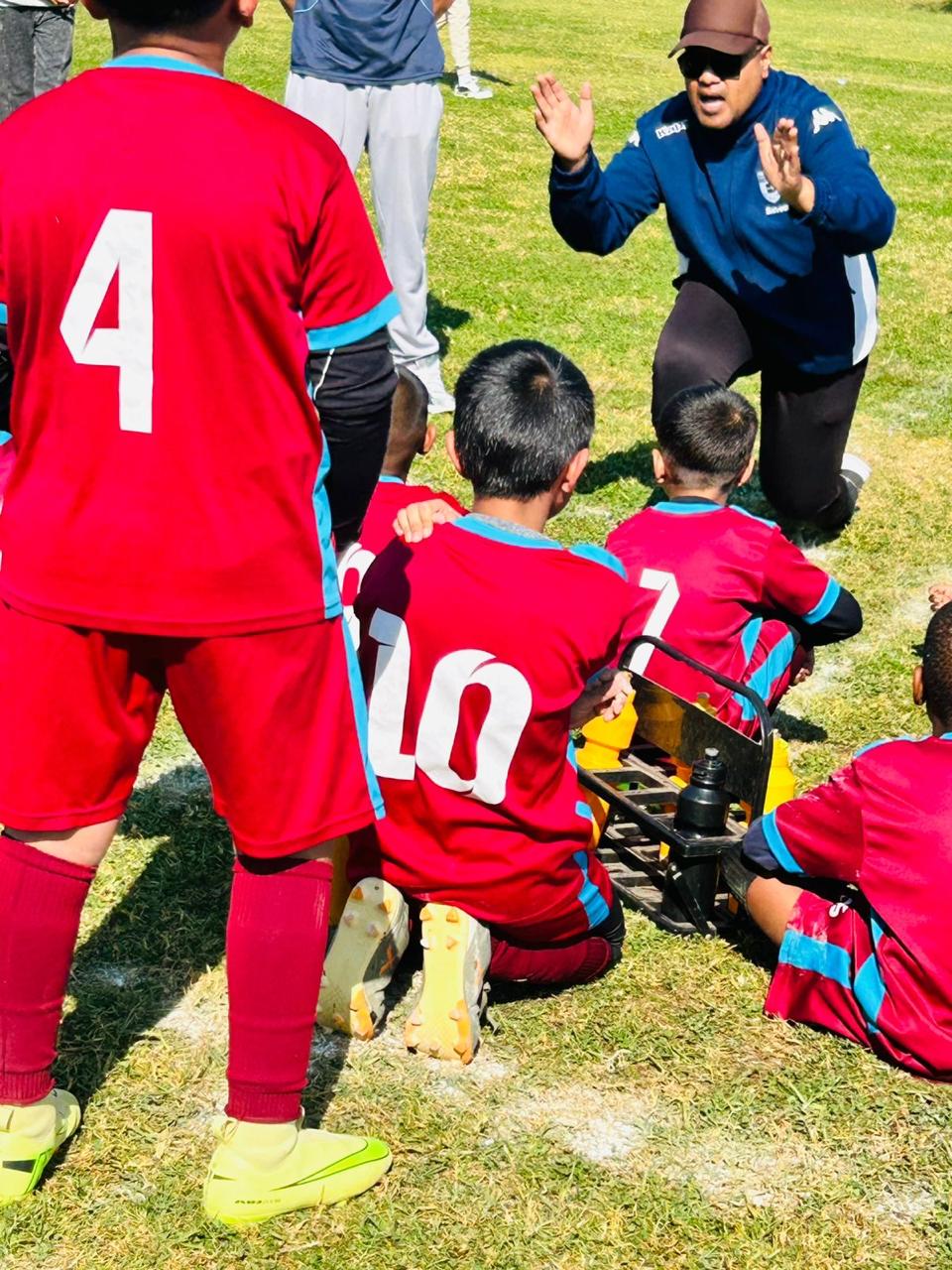 U9 vs RFC — Coach talking to players — 23 May 2026